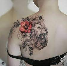 Cross with judah lion tattoos on the ribcage. 50 Ferocious Lion Tattoo Design Ideas That Will Empower You Tats N Rings