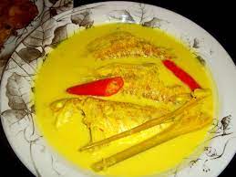 Kemudian masukkan tempoyak dan ditumbuk supaya bergaul rata. Ikan Merah Masak Lemak
