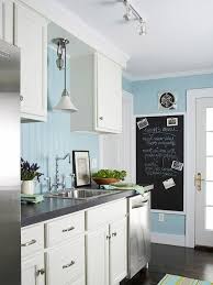 Kitchen With White Cabinets Blue Beadboard Backsplash Great Pendant Light Chalkboard Yu Cottage Style Kitchen Cottage Kitchen Design Small Cottage Kitchen