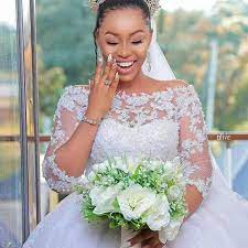 After all, a wedding should be magical, the most important event in the life of every girl. 3 4 Sleeve Beaded Lace Applique A Line Bridal Wedding Dress African Style Popular Bride Gowns Buy Wedding Dresses 3 4 Sleeve Wedding Gowns African Wedding Dresses Product On Alibaba Com