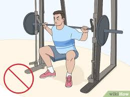 You naturally press the bar up and back, not down toward your belly button. 3 Ways To Use A Smith Machine Wikihow Fitness