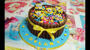 Minion birthday cake four 2 layer cakes make up the minion. How To Make This Awesome Kit Kat Cake Smarties Cake Minions Cake Youtube