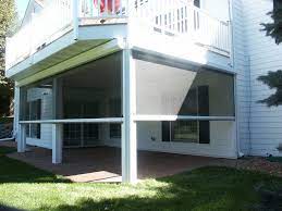 Phantom screens helps homeowners, builders and architects to have it all — shade from sun, protection from insects & uv rays, refreshing breeze and unblocked views. Phantom Retractable Screens Under Deck Traditional Patio Minneapolis By Minnesota Screens Houzz