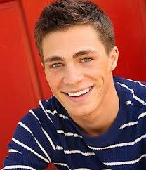 Colton Haynes Short Brunette Hairstyle With Gelled Up Bangs Blue Sweater With White Stripes Smile Green E Boys Haircuts Brown Hair Blue Eyes Cool Boys Haircuts