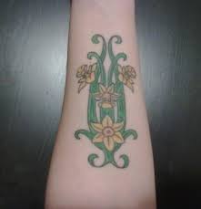 Check out an awesome array of creative blooms and ink applications for your new piece. 30 Lovely And Peaceful Daffodil Tattoo Designs