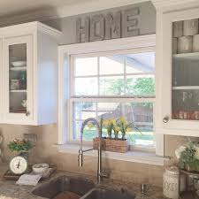 I Like The Raised Window And The Glass Cabinets Around It Sweet Home Home Kitchen Sink Decor