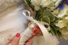 Wedding rings with flowers on background. I Tied My Grandparents Wedding Rings To My Bouquet Something Borrowed And Something Old Flower Bouquet Wedding Wedding Bouquets Bridal Bouquet