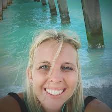 People holding signs at Walmart, assistance programs in Palatka