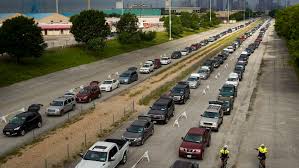 Aerial views of the event showed lines of vehicles throughout the morning as volunteers placed boxes of food inside trunks. North Texas Food Bank Plans Free Food Distribution At Fair Park On Aug 11 Walk Up Option Added