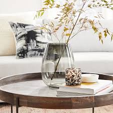 The most well known wood turned leg coffee table is the pottery barn lorraine table, but with a price tag of $1,000, it't note for everyone. Willow Round Coffee Table