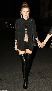 Bella Thorne wears bondage-inspired leather boots for dinner in Hollywood |  Daily Mail Online