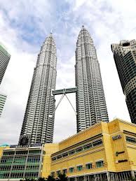 4k00:13time lapse of moving clouds over downtown kuala lumpur, malaysia. Klcc Park Best Recreational Park In Kuala Lumpur