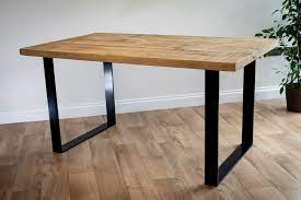 I've got a good deal of wood scraps from other projects laying about and am thinking of making a colored epoxy table, something like this: Wood Top Dining Table With Black Metal Frame Fabulous Furniture Company