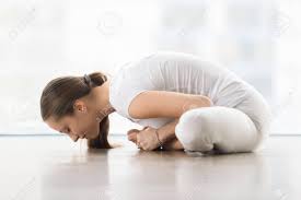 It can also be used as a meditative pose and, thus, helps in relieving stress, through physical and. Young Attractive Woman Practicing Yoga Sitting In Butterfly Exercise Baddha Konasana Pose With Forward Bend Working Out Wearing White Sportswear Indoor Full Length At Floor Window With City View Stock Photo Picture