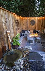 Small backyard patio ideas diy. Lighten Up Your Outdoor Space With This Fence Lighting Decortrendy Backyard Ideas For Small Yards Small Backyard Design Backyard Landscaping Designs