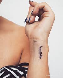 Feathers are famous tattoo designs for both men and women. 40 Feather Tattoo Designs With Meaning