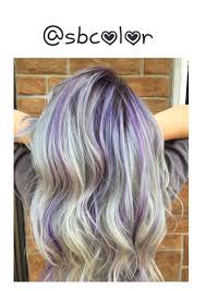 Shock blue and purple colored long wavy hair. Platinum Blonde With Purple Highlights Blonde Hair With Purple Streaks Purple Highlights Blonde Hair Purple Hair Highlights