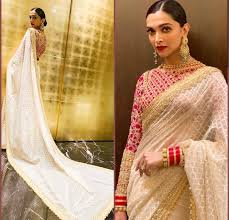 Deepika Padukone And Ranveer Singh Made Heads Turn As They Attended Isha Ambani S Wedding Hungryboo Designer Sarees Wedding Indian Bridal Dress Indian Wedding Outfits