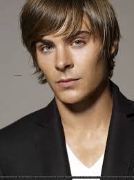 Zac Efron Might Be Young But His Appeal To Women And Is Comparable To That Of An Experienced Actor Description From Girzl Zac Efron Long Hair Zac Efron Zac