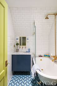 Tour A Revitalized 100 Year Old Home In Larchmont Small Bathroom Decor Bathroom Design Glass Tub Enclosure