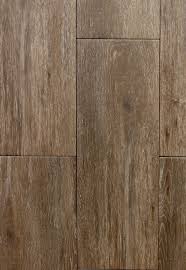 Niove Topo Brown Faux Wood 7 X 20 Ceramic Floor Tile Carpetmart Com Ceramic Floor Ceramic Floor Tile Faux Wood Tiles