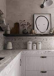 Liz morrow 's small kitchen is given space and depth with white up top for the backsplash and cabinets and deep charcoal, almost black, down below. Contemporary Gray Kitchen With Terrazzo Countertop My Paradissi