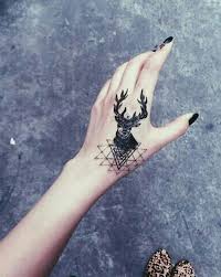 Thai tattoo hand poke style, sak yant single line down the middle back. 109 Small Hand Tattoos For Men And Women 2020