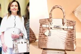 Crocodile leather is luxurious and posh material to produce various accessories. Nita Ambani S Crocodile Skin Handbag Worth Rs 2 6 Cr Studded With 240 Diamonds Goes Viral