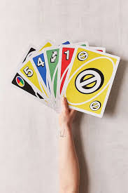 How to play the first player takes a card. Urban Outfitters Giant Uno Card Game Uno Card Game Card Games Uno Cards