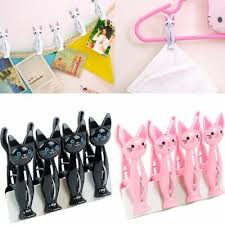 This cat was trying to climb on some hangers, but it proved much more difficult than he thought. 4pcs Set Plastic Cartoon Cat Clothes Pin Clips Clamps Hanging Laundry Pegs Hooks Ebay