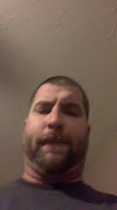 Guy Dumping Corn by His Deer Stand