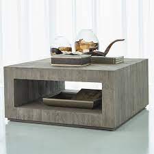 With a spacious white faux marble square top, this modern coffee table is the perfect furniture piece to place in front of a seating arrangement. Driftwood Square Coffee Table Grey