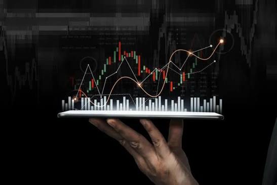 Trader analyzing market charts