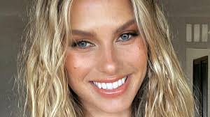 Natalie Roser strips down by the pool for bikini breakfast