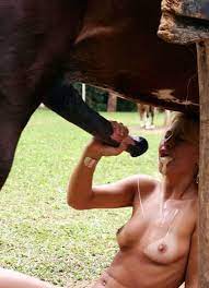 Horse cums in woman's mouth