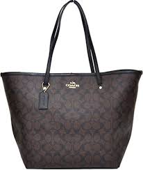 Black And Brown Coach Purse Coach Signature Large Taxi Tote Brown Black 34105 Accessorising Brand Name Designer Handbags For Carry Wear Share If You Care Coach Handbags Outlet Coach Purses Coach Tote Bags