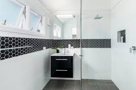 A small glass buffet holds towels and bathroom staples. 71 Cool Black And White Bathroom Design Ideas Digsdigs