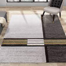 Yellow rugs are often associated with brightness and vibrancy; Midtown Grey Black Yellow Quadrant Rug Overstock 29557735 7 10 X 10 6