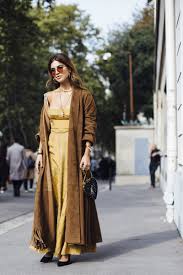 Your outfit looks cool and vibrant. Earth Tones The Best Outfits Worn To Paris Fashion Week Livingly
