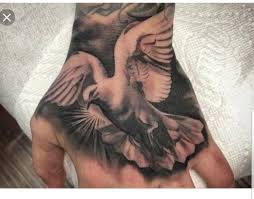 Bird Tattoo On Hand Men Pin By Xavi Colon On Tattoo Hand Tattoos Hand Tattoos For Guys Skull Hand Tattoo