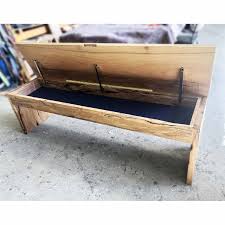 Strap 4 storage crates together with tape around handles, flip onto lid to keep level and brace the crates with a plank of laminate flooring. Bench Seat With Storage