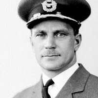 An American sailor checks out the cockpit of a Soviet Ka-27 Helix  helicopter during an open house aboard one of the three Soviet Pacific  Fleet ships that are in San Diego for