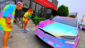 Posted on december 11, 2019. Tesla Owner Graffitis Own Car For Bizarre Unicorn Wrap