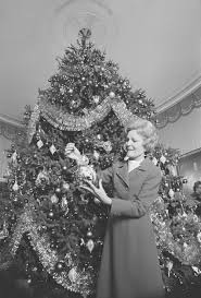 Four large christmas trees decorated in glass ornaments make for a suitably grand display in the white house's grand foyer and cross hall. A Timeline Of White House Christmas Decorations Through The Years