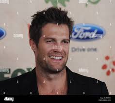 Geoff Stults, a cast member in the new television series "Enlisted," poses  at the premiere screening of the show