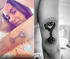 Tatuagem feminina rosas braço delicada. Ainda Na Europa Anitta Se Empolga E Faz Varias Tatuagens De Uma So Vez Popline