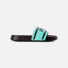 Explore the official ugg® women's slide slippers collection for the perfect fit in our luxuriously soft and cozy slippers. Iconic Sandals And Trendy Bathing Shoes For Women Fila Europe