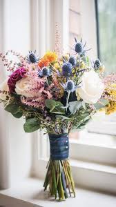 Autumnal Shades Of Celosia Roses Astillbe Thistle And Carthamus Beautiful Flowers Flower Arrangements Tiger Lily Wedding Flowers