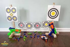 My son and his friends love having nerf battles in the neighborhood park we also discovered that storing the nerf guns flat outdoors allows them to collect water inside, rusting the springs and rendering them useless. Diy Nerf Gun Target Stand Simple Scrap Wood Project Mama Needs A Project