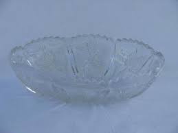 Unusual pressed glass handled plate with basket weave pattern, 10 1/2 across the handles. Vintage Glassware Pressed Pattern Glass Crystal